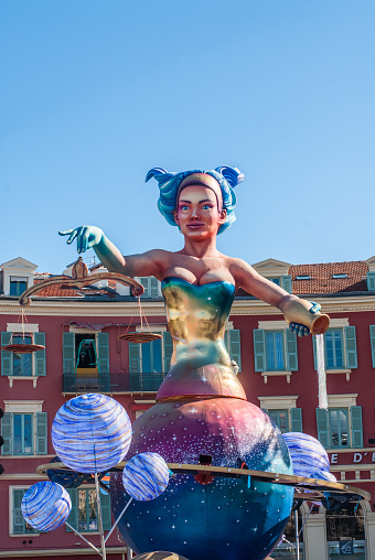 Nice, France - February 18, 2018: The theme of the Carnival is the King of Space, so the characters of the King and the Queen meet on Place Masséna by attending events