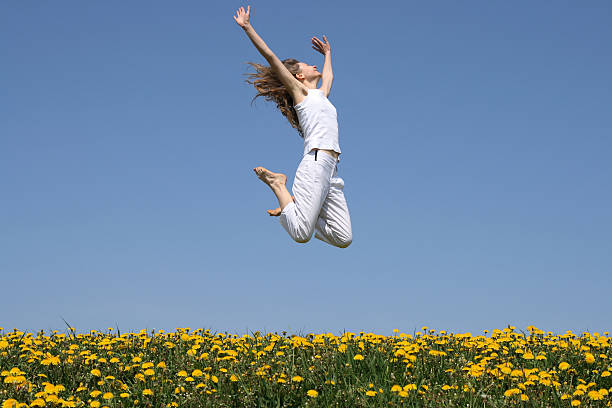 istock Girl in a happy jump 92265213