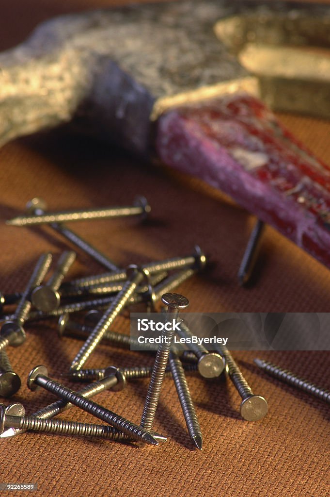 Martillo de vida de las uñas - Foto de stock de Abrazadera libre de derechos