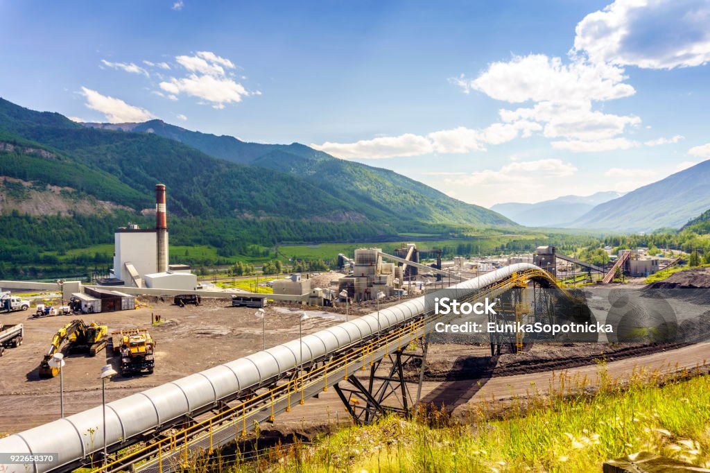 Big industrial infrastructure among mountains in Canada Big industrial infrastructure among mountains in Alberta, Canada Mining - Natural Resources Stock Photo