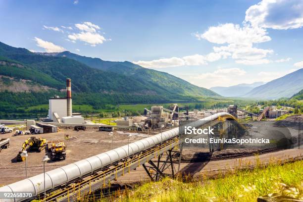 Big Industrial Infrastructure Among Mountains In Canada Stock Photo - Download Image Now