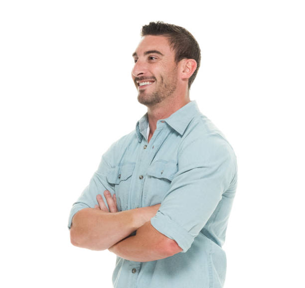 istock Charming man waist up arms crossed 922659464