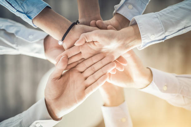 Stack Of Hands Unity And Teamwork Concept Stock Photo - Download Image Now  - Hand, Handshake, Group Of People - iStock