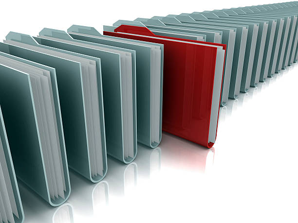 istock Row of gray folders with red folder standing out 92266044
