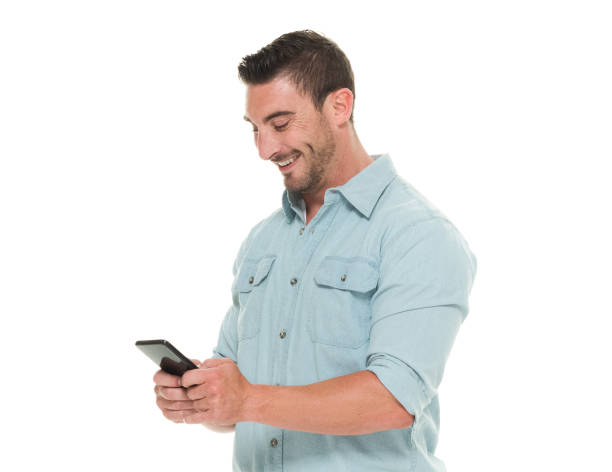 istock Charming man waist up using smart phone 922660580