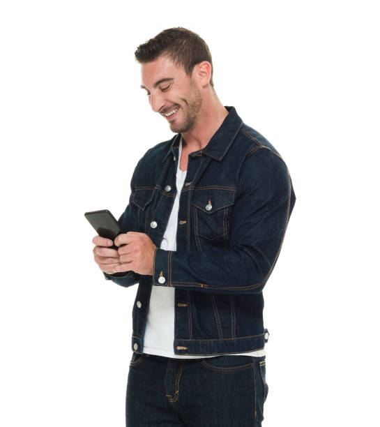 istock Waist up view of attractive man using cell phone 922660962