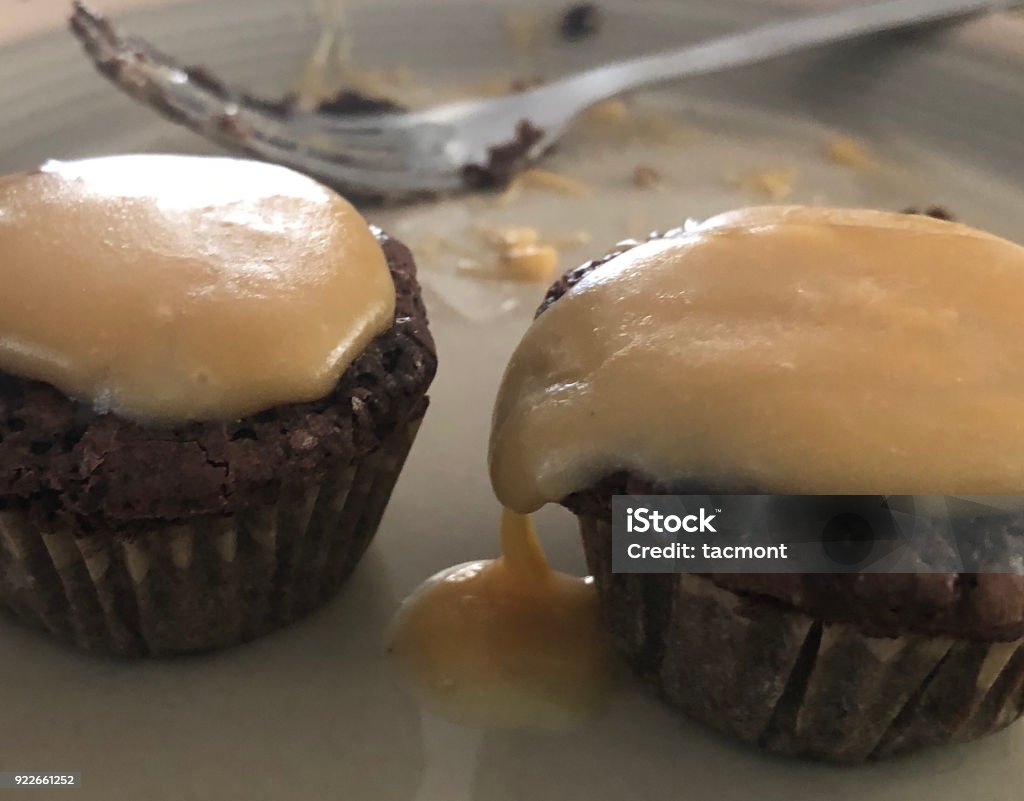 Brownie Cup Cakes with Frosting Tasty little bite size brownie cup cakes with delicious caramel frosting. Award Stock Photo