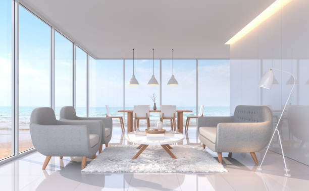 istock Modern white living and dining room with sea view 3d rendering image. 922662694