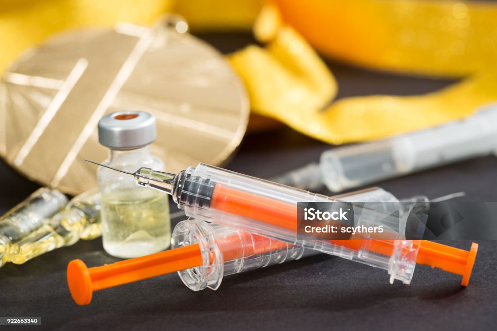 doping steroid sport drugs health closeup win syringe doping steroid sport drugs health closeup win syringe abuse many athletics liquid concept - stock image Erythropoietin Stock Photo
