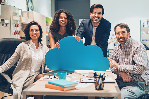 Multi-ethnic group of people on a cloud computing concept