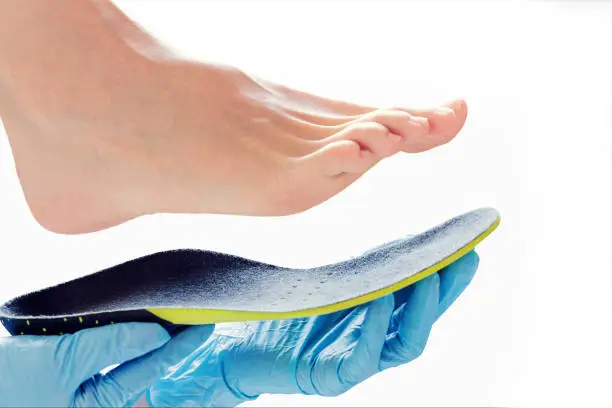 Photo of orthopedic insole in the hands
