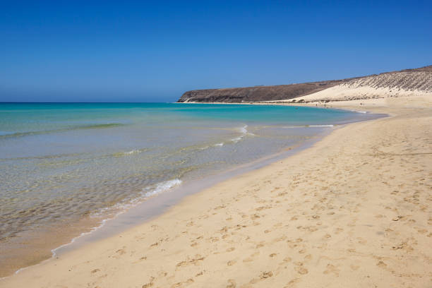 пляж джандия риско эль-пасо фуэртевентура на канарских островах испании - risco el paso стоковые фото и изображения