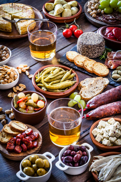 istock Beer and tapas shot on rustic wooden table 922666688