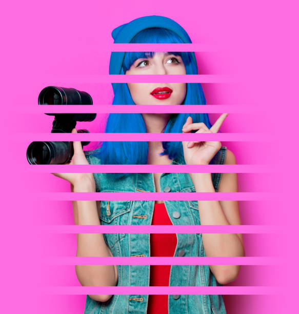 istock hipster girl with blue hair and binoculars 922667584