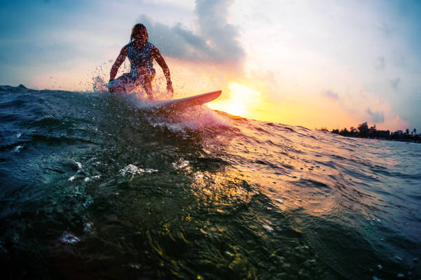 istock Surfer trying to catch the ocean wave 922668308