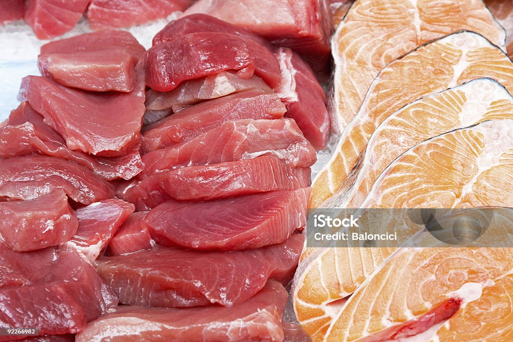 Tuna and salmon Bunch of fresh tuna steaks and salmon cutlets Backgrounds Stock Photo