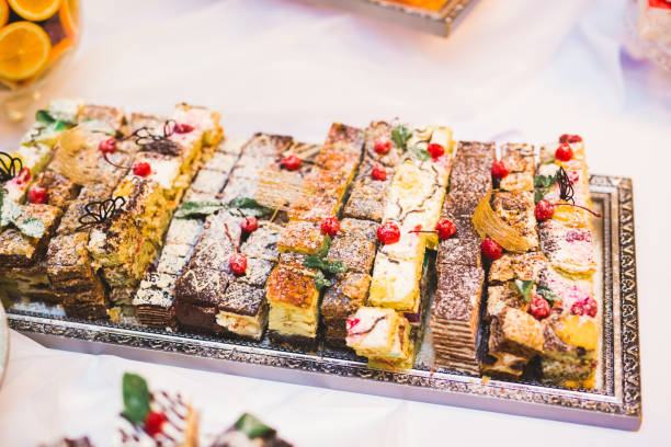istock Delicious sweets on wedding candy buffet with desserts, cupcakes 922670592