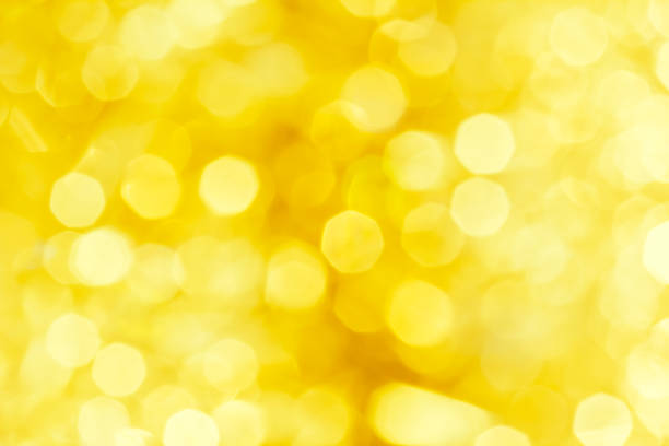 istock White and gold bokeh for festive background 922670728