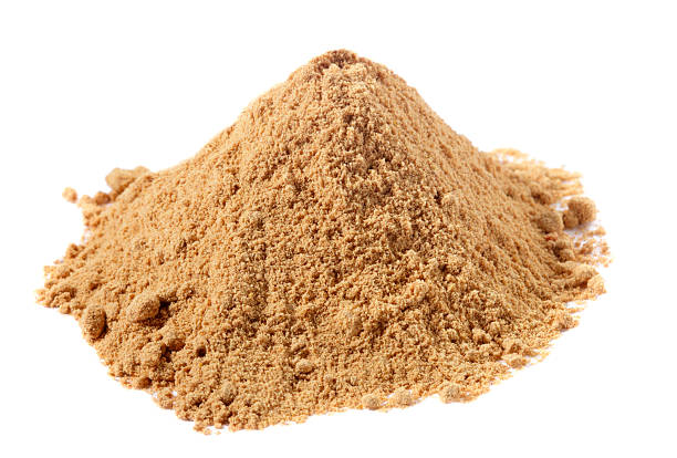 istock spices - pile of Ginger powder over white 92267288