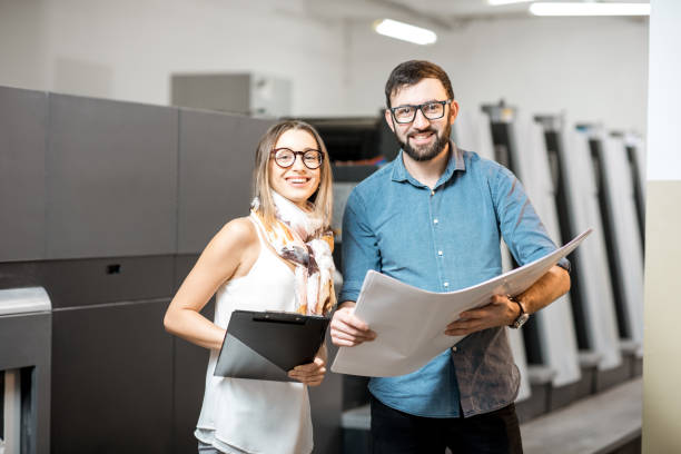 istock Woman with print operator at the manufacturing 922674056