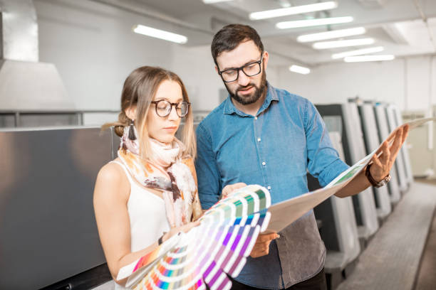 istock Woman with print operator at the manufacturing 922674308