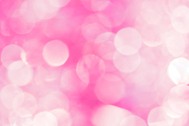 istock Pink and white luminous festive bokeh 922674418