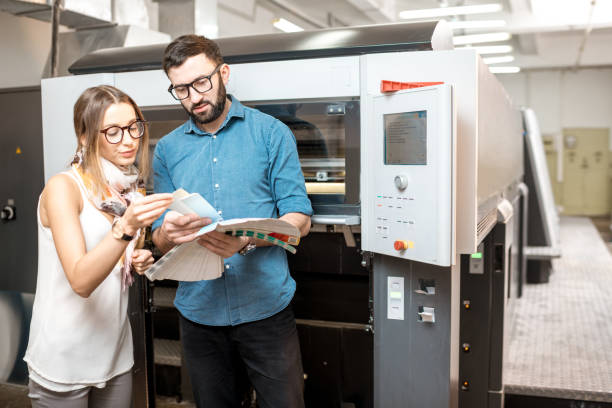 istock Woman with print operator at the manufacturing 922674704