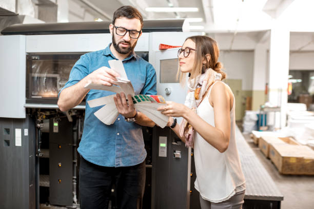istock Woman with print operator at the manufacturing 922674858