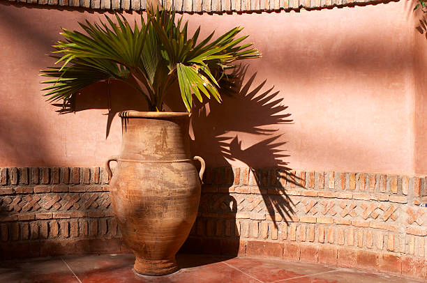 istock Garden urn with palm leaves 92267511