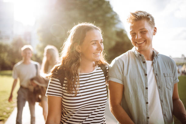 istock happiness student walking togetherness in london at dusk 922675408