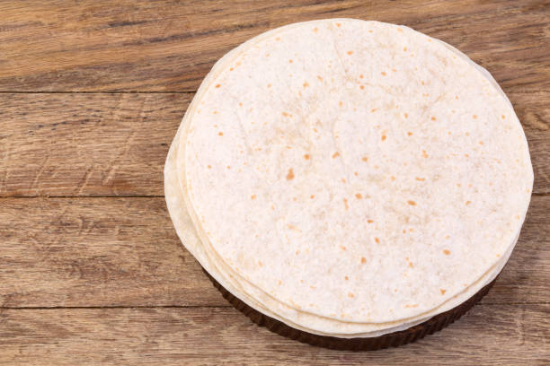 istock tortilla  on wooden table 922676416