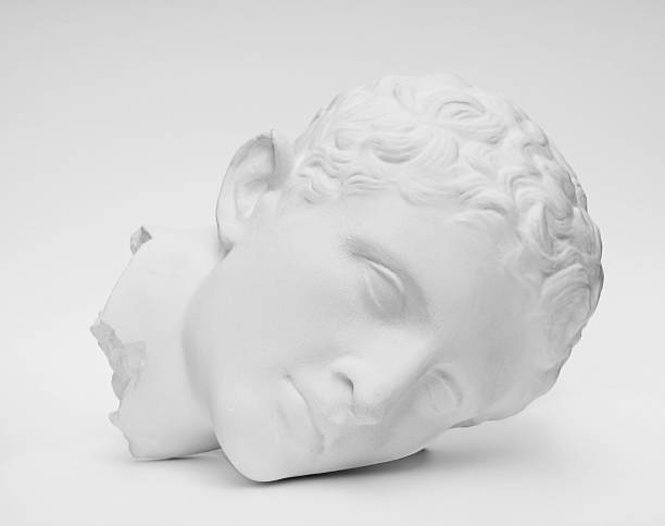 Classical Head. A plaster cast of a classical Roman or Greek statue.  Black and white photograph. statue stock pictures, royalty-free photos & images