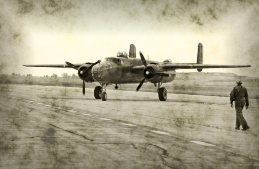 WW2 Mitchell B-25 Medium Bombers flying in V-Formation