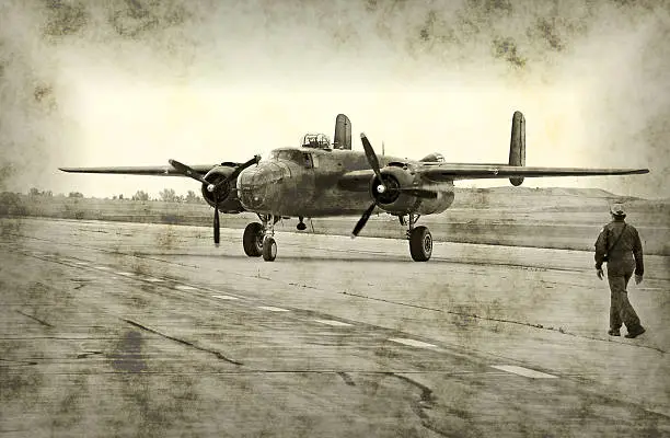 Photo of World War II airplane and pilot