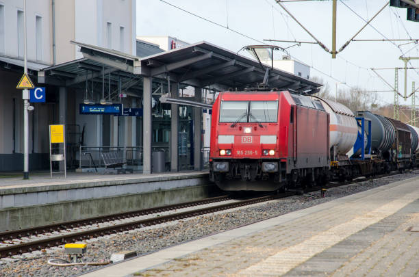Freight train Deutsche Bahn at the railway station. Soest, Germany - December 28, 2017: Freight train Deutsche Bahn at the railway station. deutsche bahn stock pictures, royalty-free photos & images