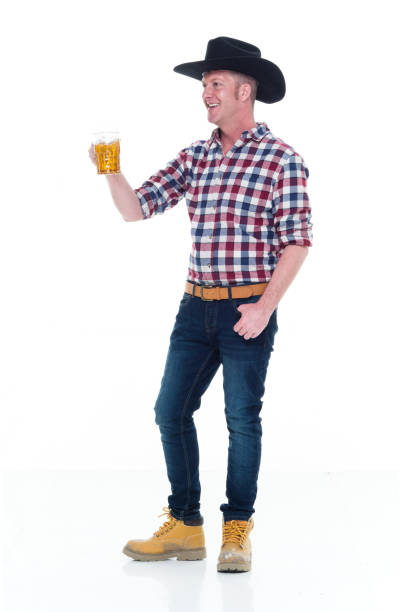 istock Farmer holding beer and being happy 922682652