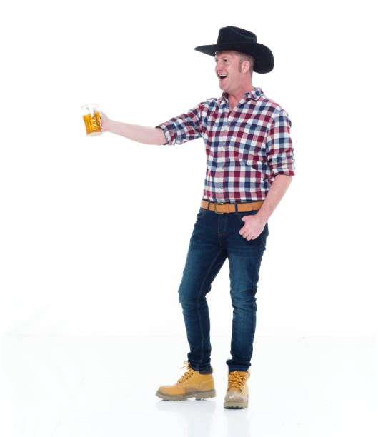 istock Farmer holding beer and being happy 922683152