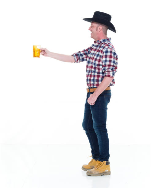 istock Farmer holding beer and being happy 922683158