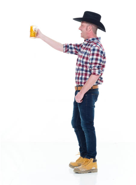istock Farmer holding beer and being happy 922683160