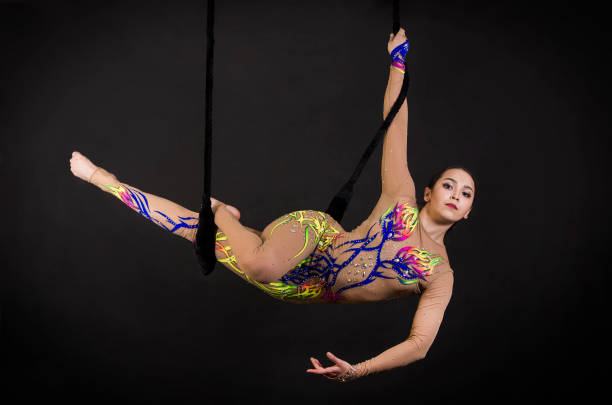 istock Aerial acrobat in the trapeze. 922684936