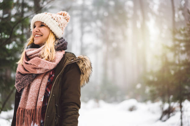 istock Beautiful girl taking a walk in the forest 922685102