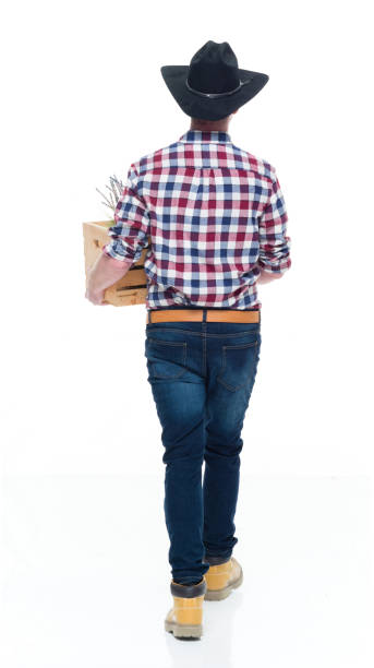 istock Gardner holding a wood crate with plants 922685212