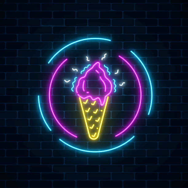 istock Glowing neon ice cream cone signboard in circle frames on dark brick wall background. Fruit ice-cream in waffle cone. 922692704