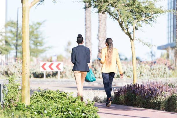 istock Colleagues walking on the sidewalk 922692712