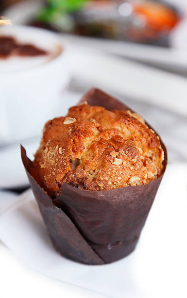 istock freshly made Muffin with  unfocused coffee cappuchino on backgro 92269330