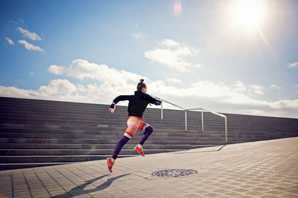 istock Runner girl is sprinting 922693504