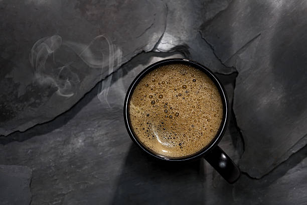 istock steamed spresso coffee in black cup on  stone background 92269791