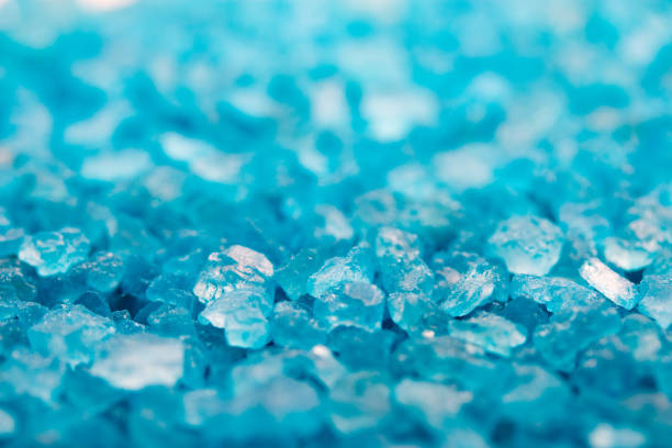 istock Background of blue bath salt close-up 922702018