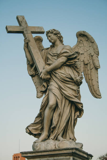 istock Angel with the Cross. 922702568
