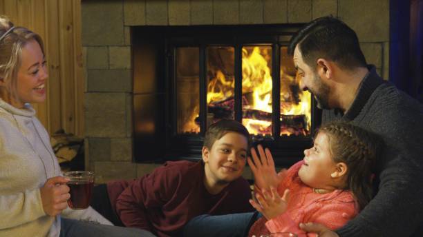 istock Content family at fireplace before Christmas 922703124